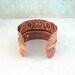 Very rustic fold formed copper cuff bracelet with braille "I am enough" Contracted Grade 2 Braille Perkins E-Z Read Slate.